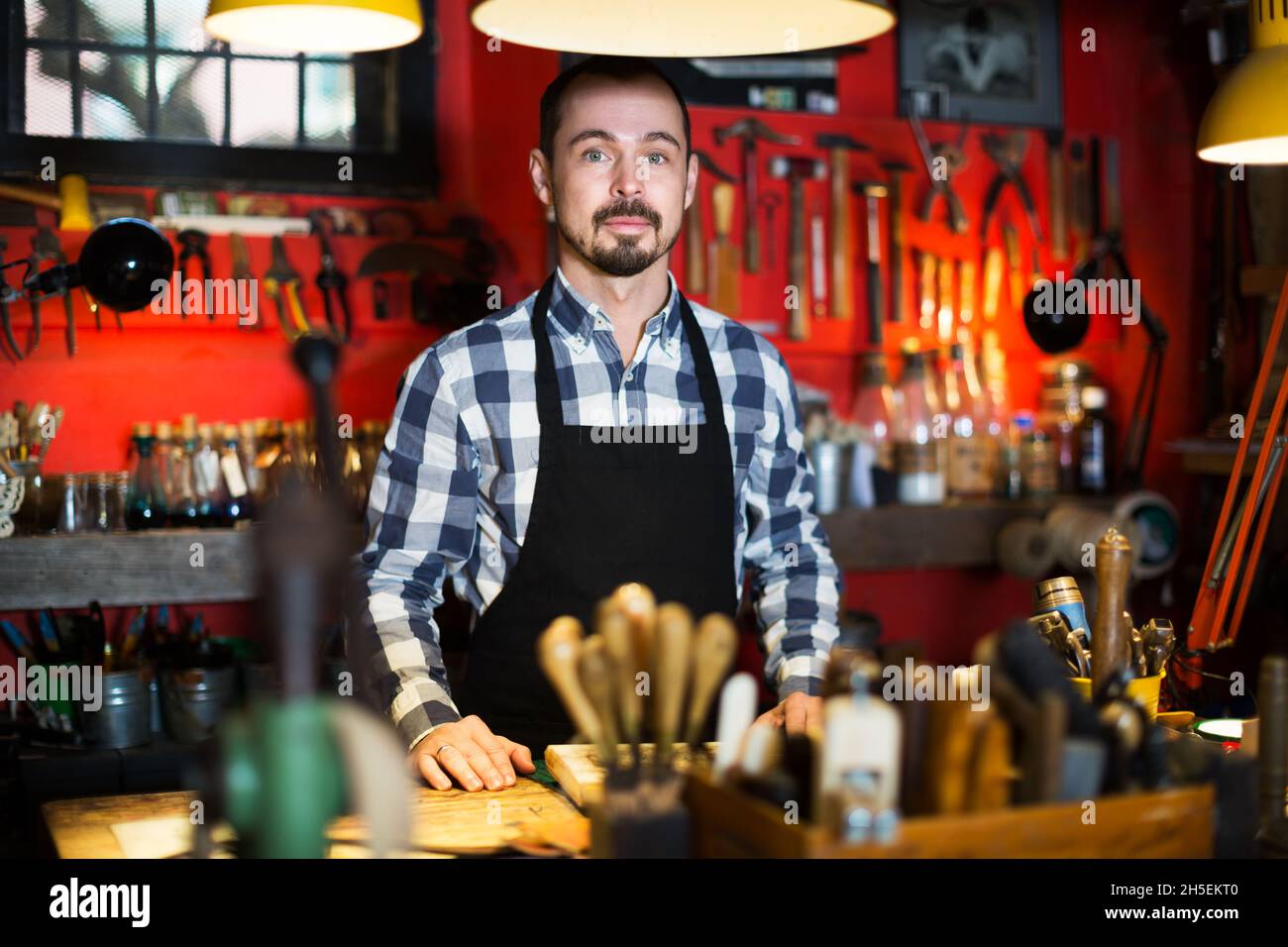 Male worker in leather hi-res stock photography and images - Alamy