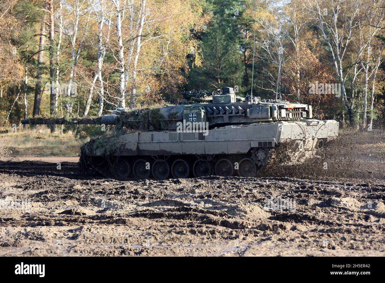 Letzlingen, Germany. 09th Nov, 2021. A Leopard main battle tank from Tank  Battalion 393 drives through the terrain at the Army Combat Training  Centre. The tank battalion 393 from Bad Frankenhausen, which