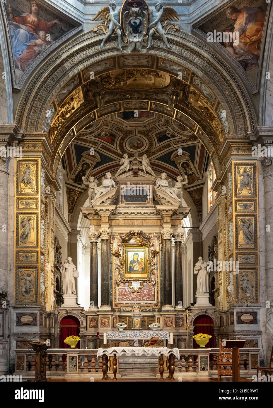 Rome. Italy. Basilica di Santa Maria del Popolo. Interior view of the high altar and choir. Stock Photo