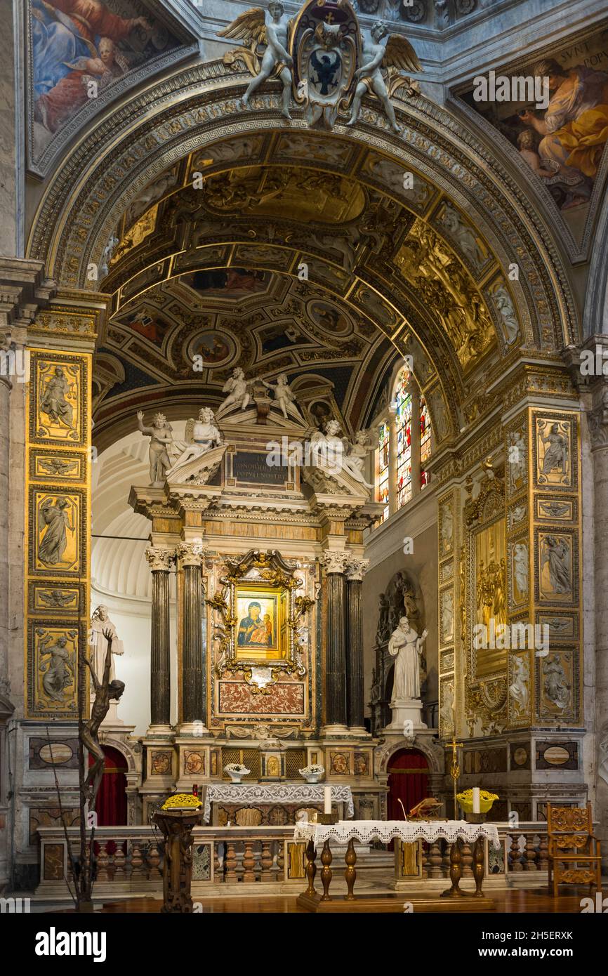 Rome. Italy. Basilica di Santa Maria del Popolo. Interior view of the high altar and choir. Stock Photo
