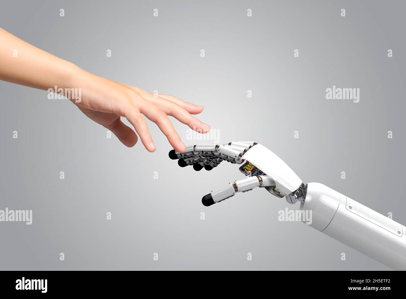 Composite image of robot interaction with human Stock Photo
