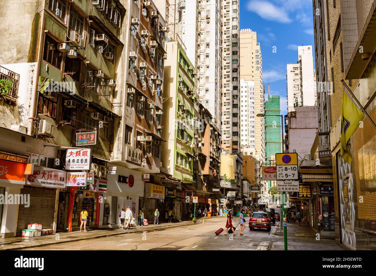 Hong Kong, China - 05 May 2018: Historical street of rundown old apartments in Sai Ying Pun area. Stock Photo