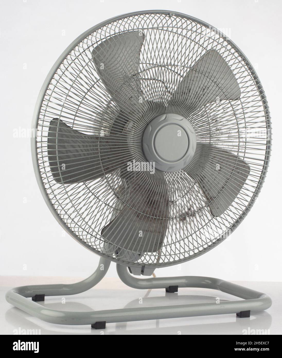 Electric fan with dust on front cover, indoor air pollution Stock Photo Alamy