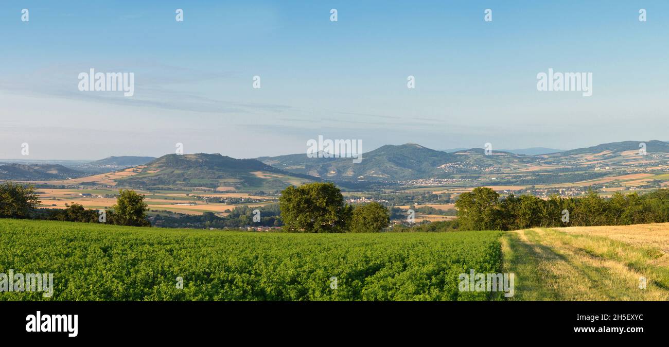 A beautiful viewpoint with a volcanic mountains landscape at the horizon. Stock Photo
