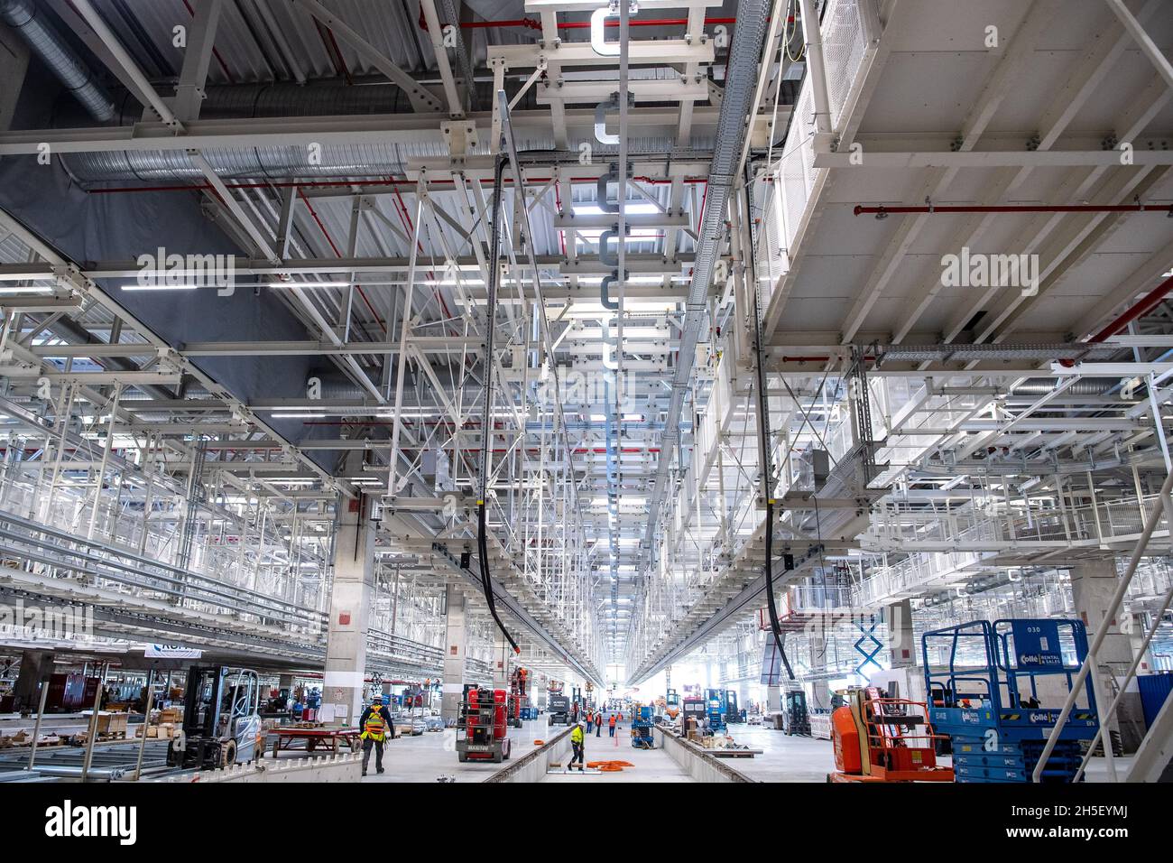 Emden, Germany. 09th Nov, 2021. Construction is underway in the new hall for the production of electric cars. The VW site in Emden is being developed into Lower Saxony's first plant for electric vehicles. Credit: Sina Schuldt/dpa/Alamy Live News Stock Photo