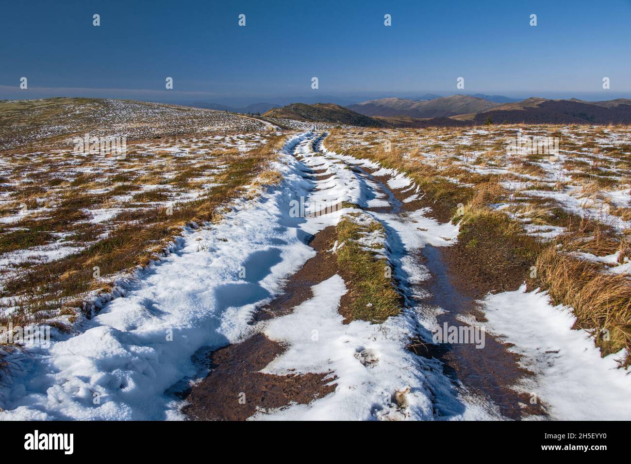 View of hills of vast Water Dividing ridge covered in red, orange and ...