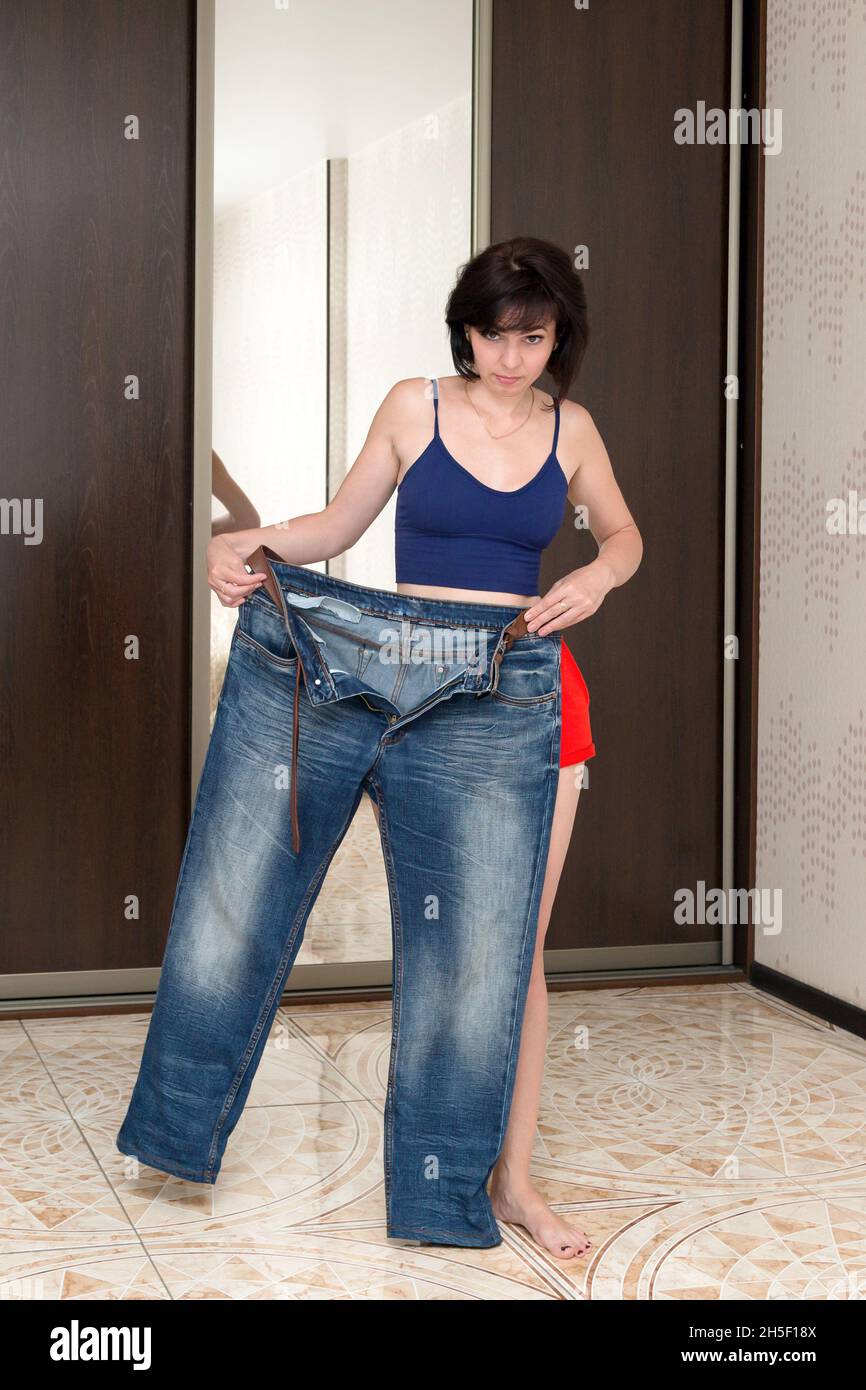 Woman showing her legs hi-res stock photography and images - Alamy