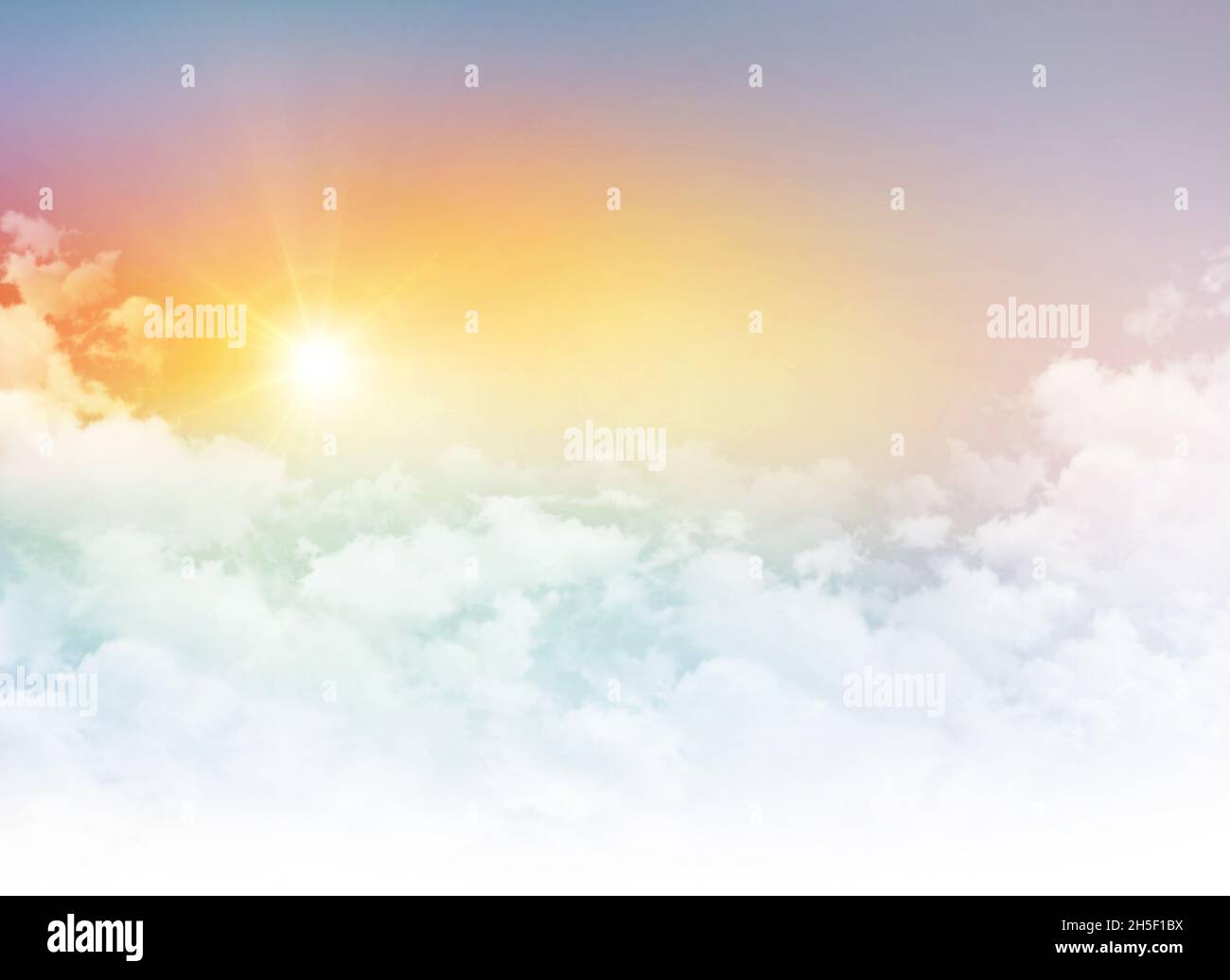 Sunrise in the morning colorful sky with white low clouds, on a clear new day in Heaven Stock Photo
