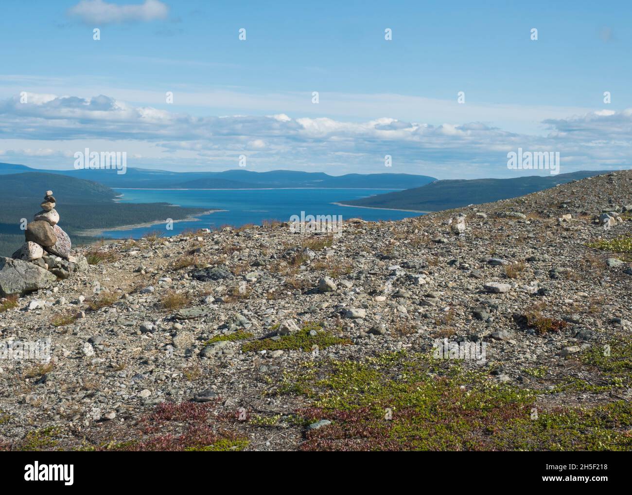 View on Tjaktjajaure lake, valley from Kungsleden hiking trail in Sarek national park, Sweden Lapland. Nordic wild landscape with mountains, hill Stock Photo