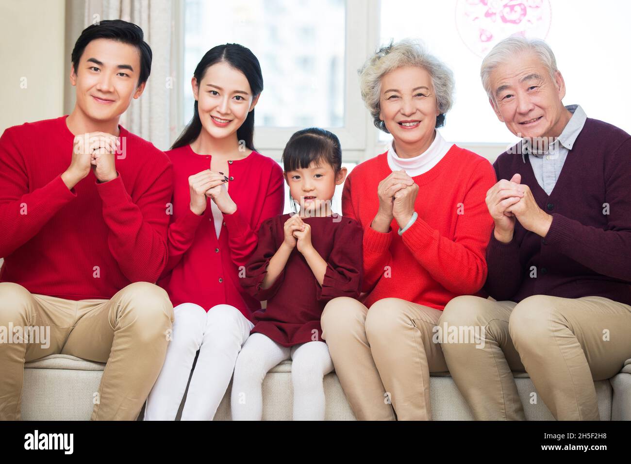 Happy families congratulating the New Year Stock Photo