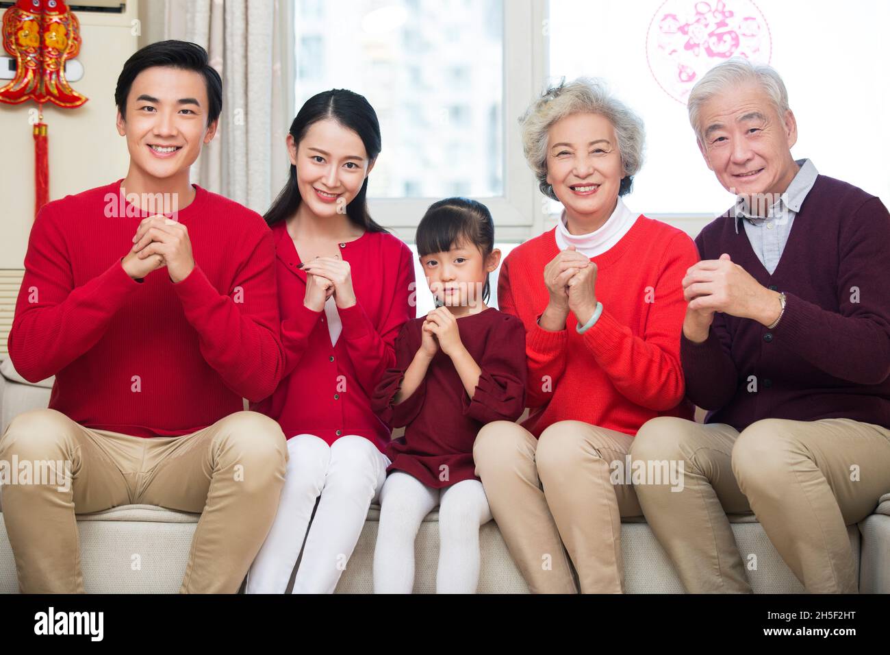 Happy families congratulating the New Year Stock Photo