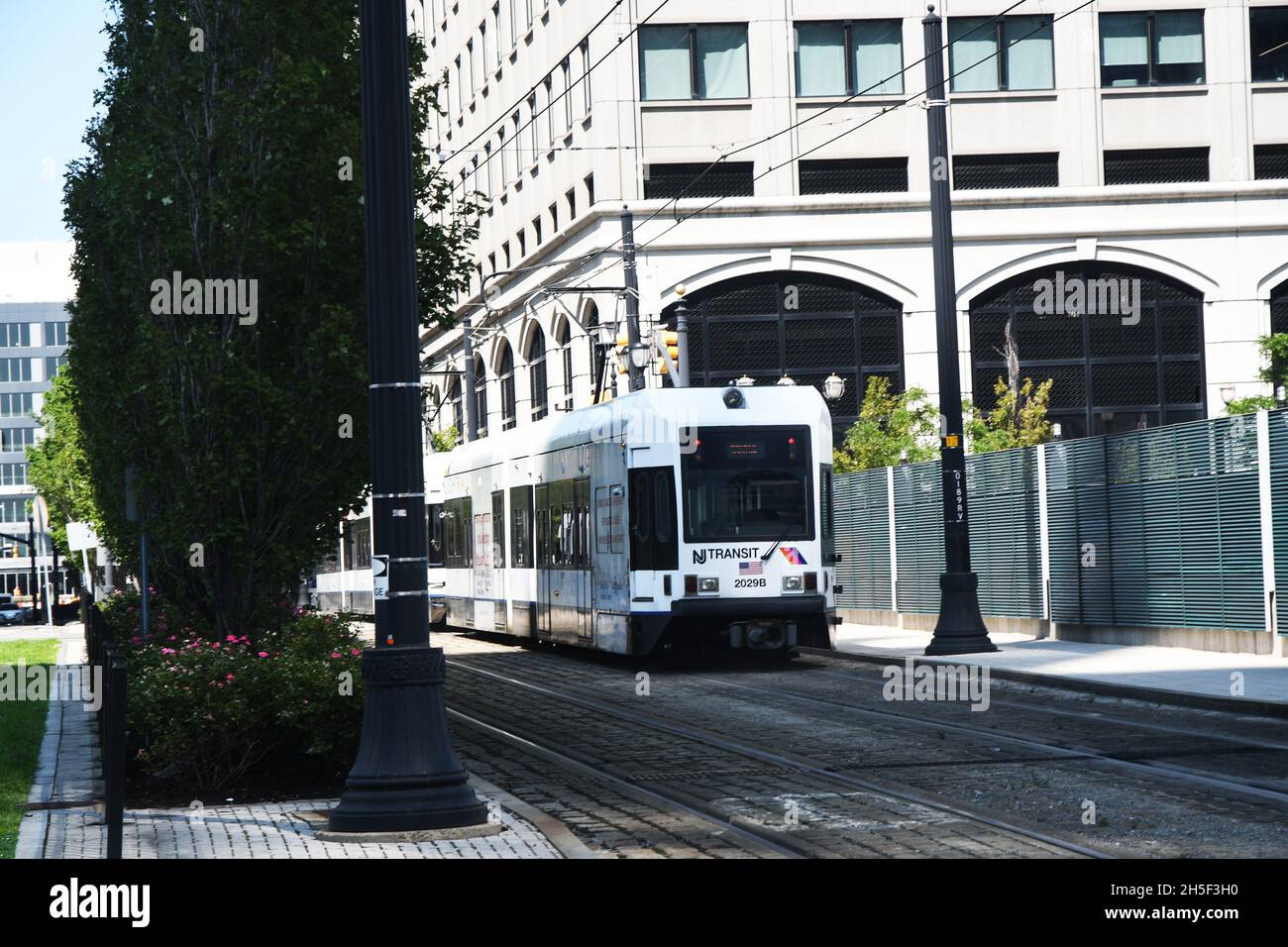 COBBLESTONE WAY: The New Jersey transit light rail train travels down ...