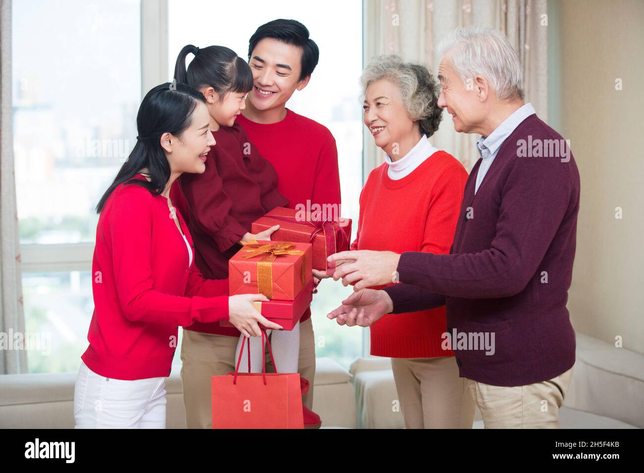 Happy families celebrating the New Year Stock Photo