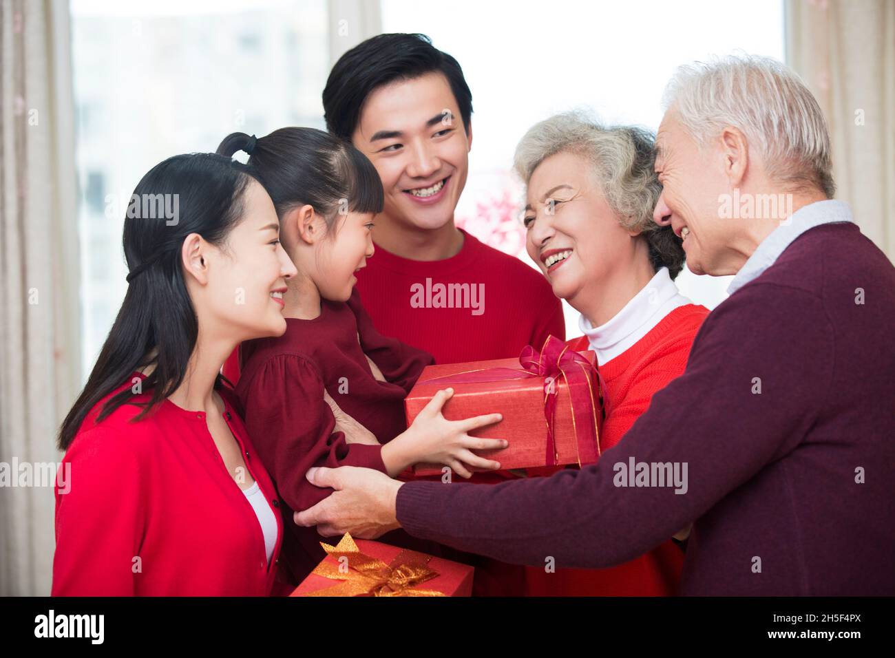 Happy families celebrating the New Year Stock Photo