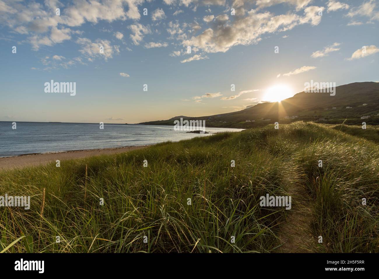 Mesmerizing view of a beautiful seascape at scenic sunset in Tullan Strand Bundoran, Donegal Stock Photo