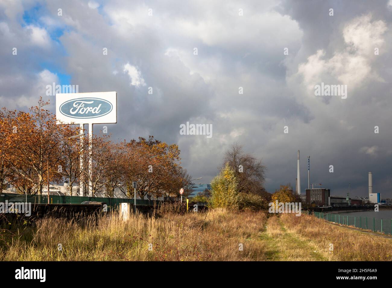 large advertising sign at the Ford automobile factory in the town district Niehl, Cologne, Germany.  grosses Werbeschild an den Ford-Werken in Niehl, Stock Photo