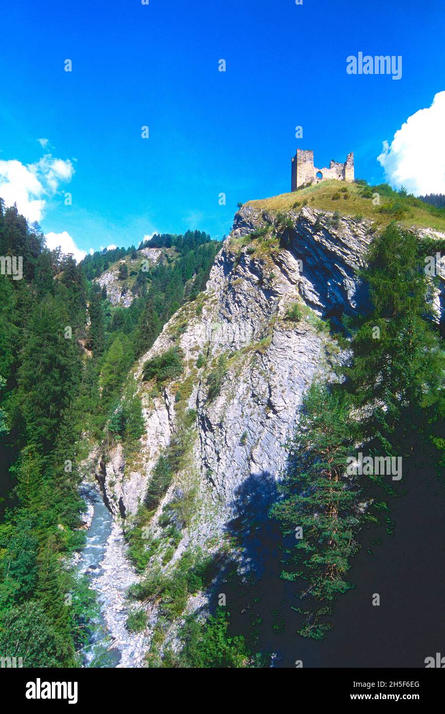 Ruined caslte Tschanüff, rock face, Inn, river, Ramosch, Engadin, Canton of Graubünden, Switzerland Stock Photo