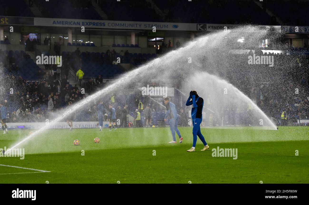Watering the pitch during the Premier League match between Brighton & Hove Albion  and Newcastle United at The Amex Stadium  , Brighton  , UK - 6th November 2021 - Editorial use only. No merchandising. For Football images FA and Premier League restrictions apply inc. no internet/mobile usage without FAPL license - for details contact Football Dataco Stock Photo