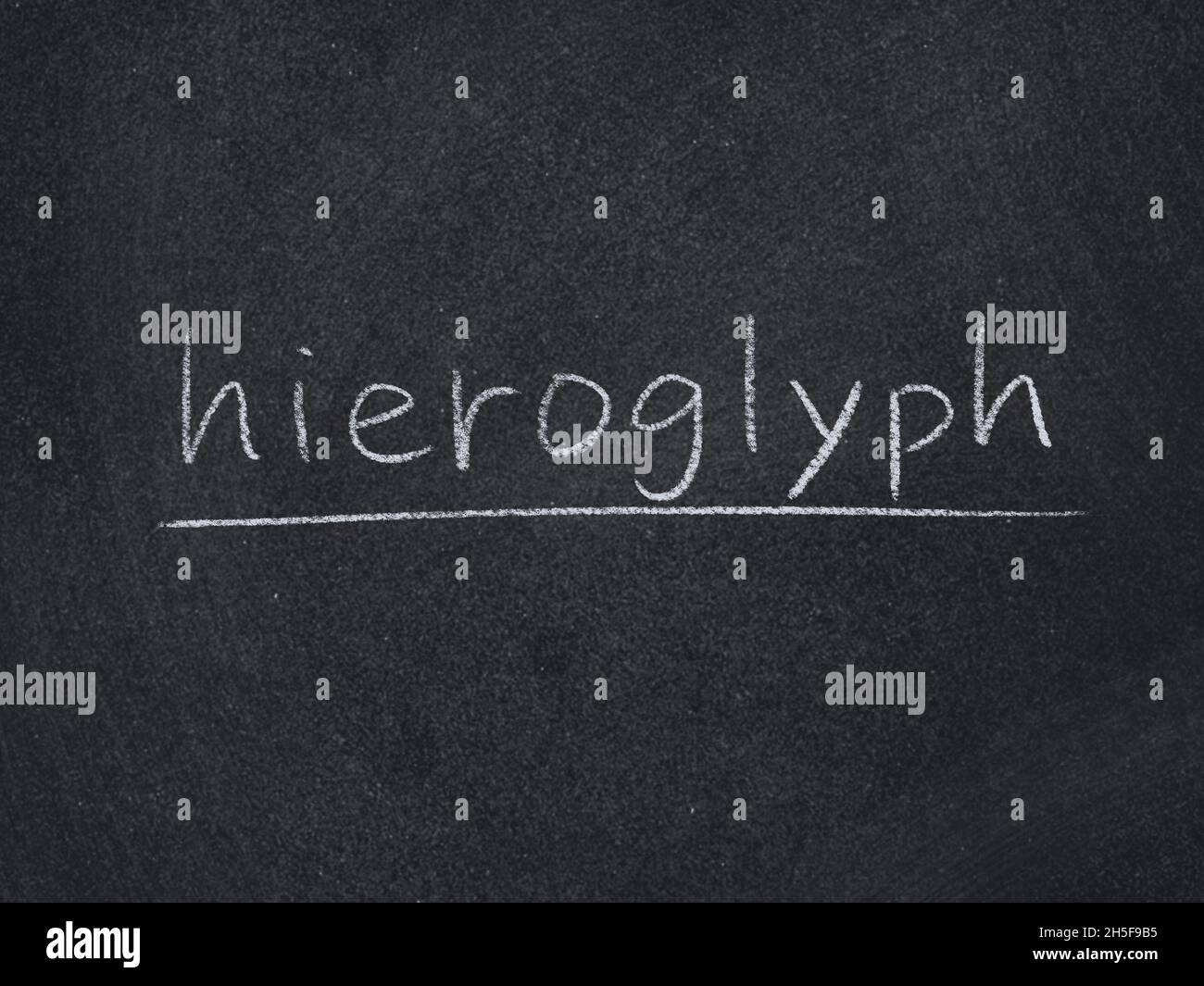 hieroglyph concept word on blackboard background Stock Photo