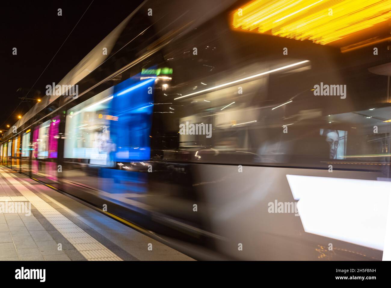 blurred public transport tram in Luxembourg city going to the central train station (Gare centrale) Stock Photo