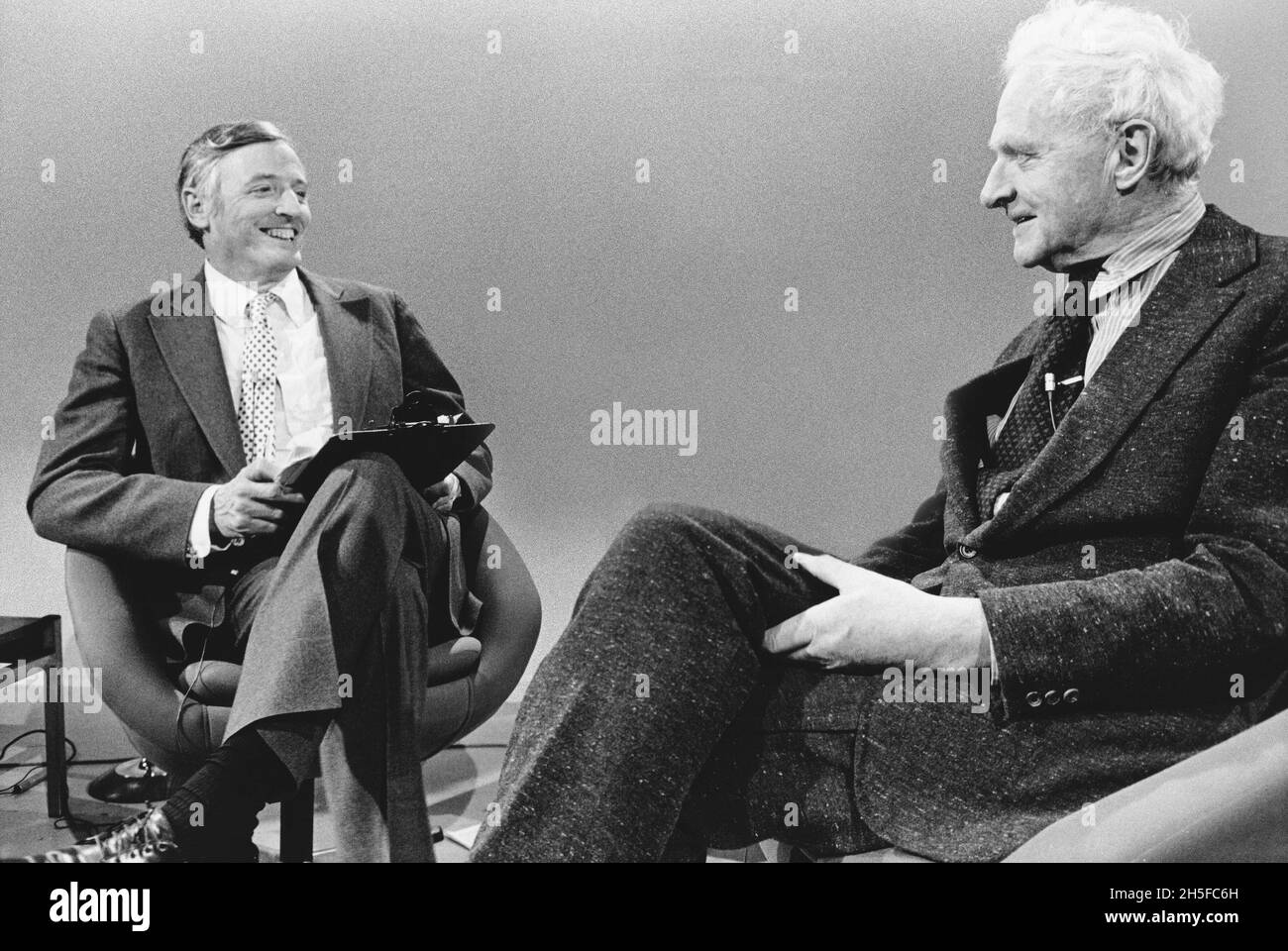 William F Buckley debating with Stephen Spender during a 1975 TV recording in London of the long-running American public affairs TV programme FIRING LINE Stock Photo