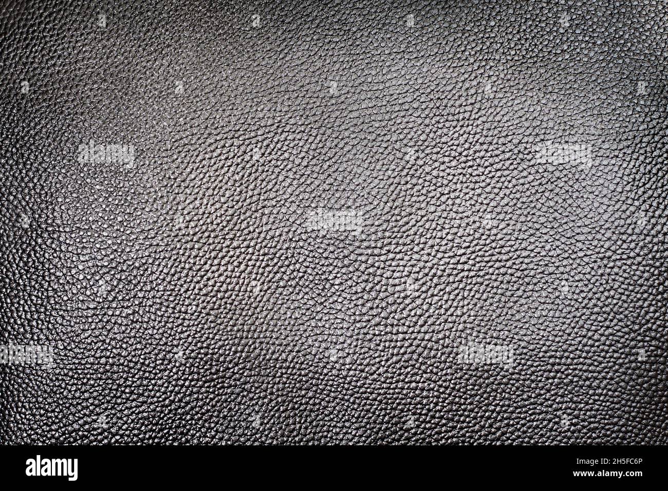 Dark silver leather background texture closeup Stock Photo