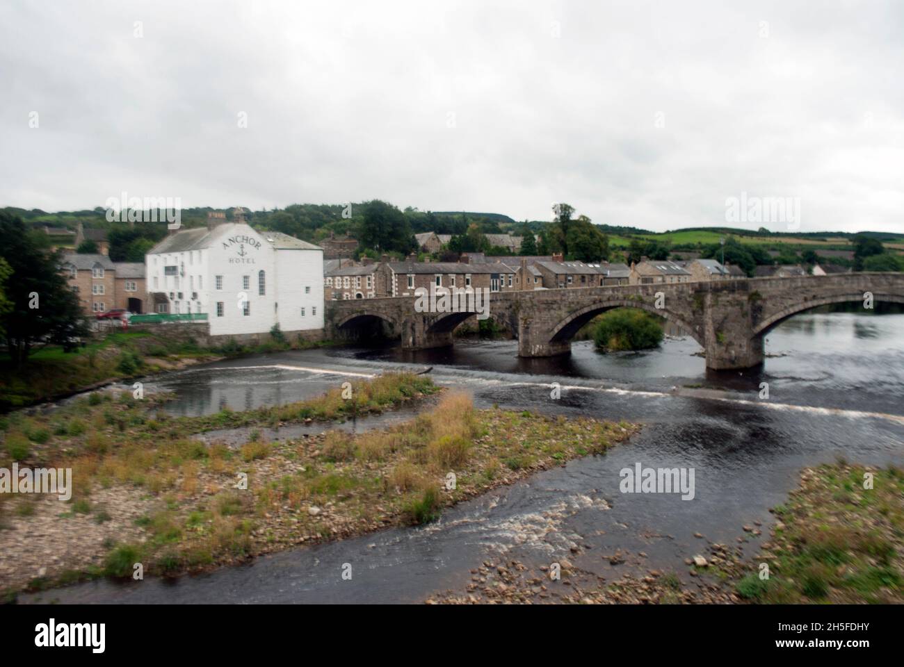 River South Tyne and Old Haydon Bridge next to White painted Anchor