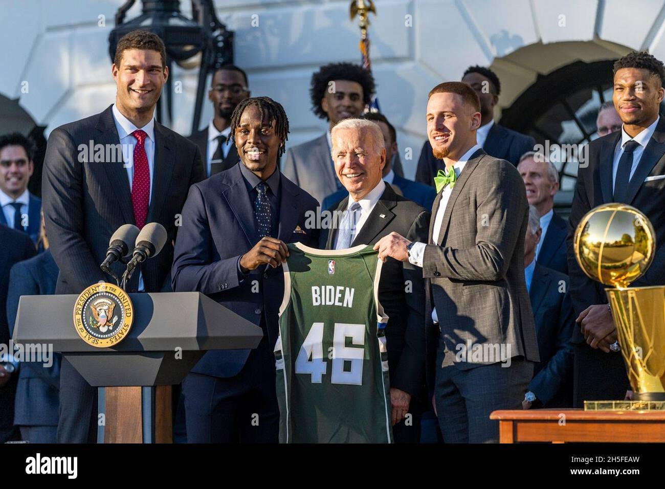Washington, United States Of America. 08th Nov, 2021. Washington, United States of America. 08 November, 2021. U.S President Joe Biden is presented a team jersey during a gathering to celebrate the 2021 NBA Champion Milwaukee Bucks basketball team on the South Lawn of the White House November 8, 2021 in Washington, DC Credit: Adam Schultz/White House Photo/Alamy Live News Stock Photo