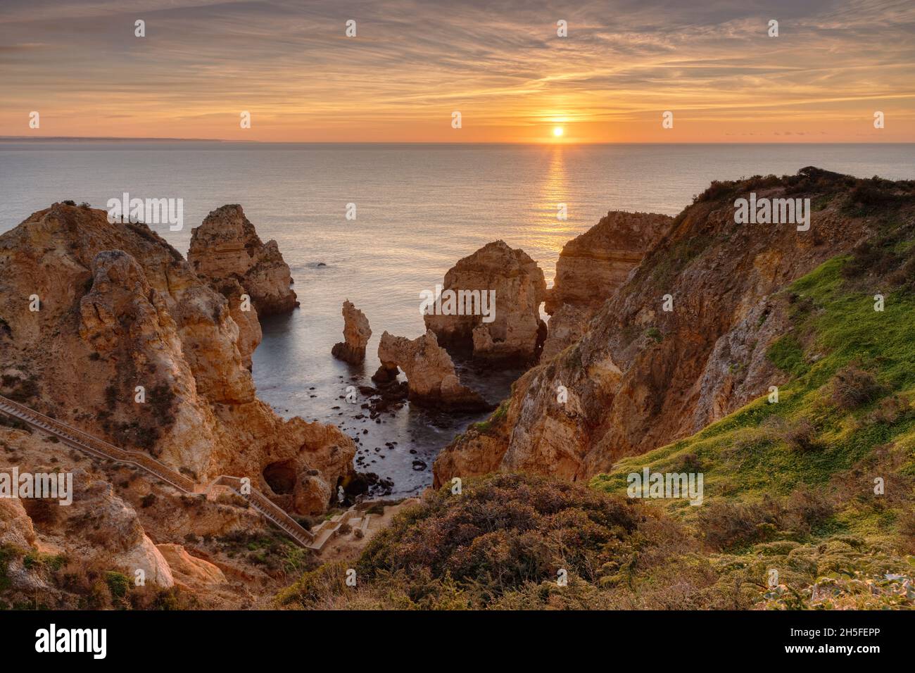 Ponta da Piedade ia a headland with spectacular and scenic rock formations near the town of Lagos in the Algarve region of Portugal. Stock Photo