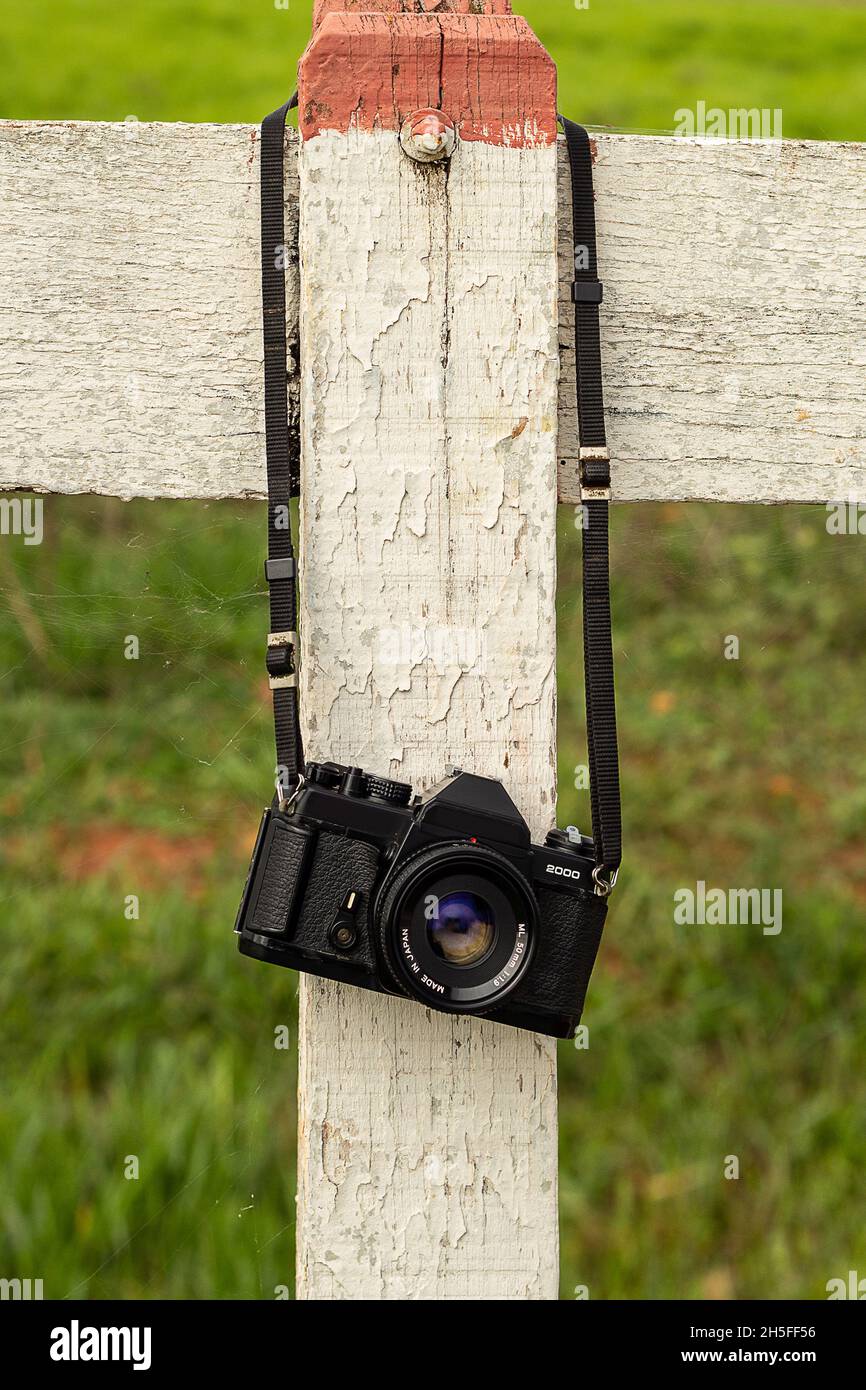Camera hanging from fence hi-res stock photography and images - Alamy