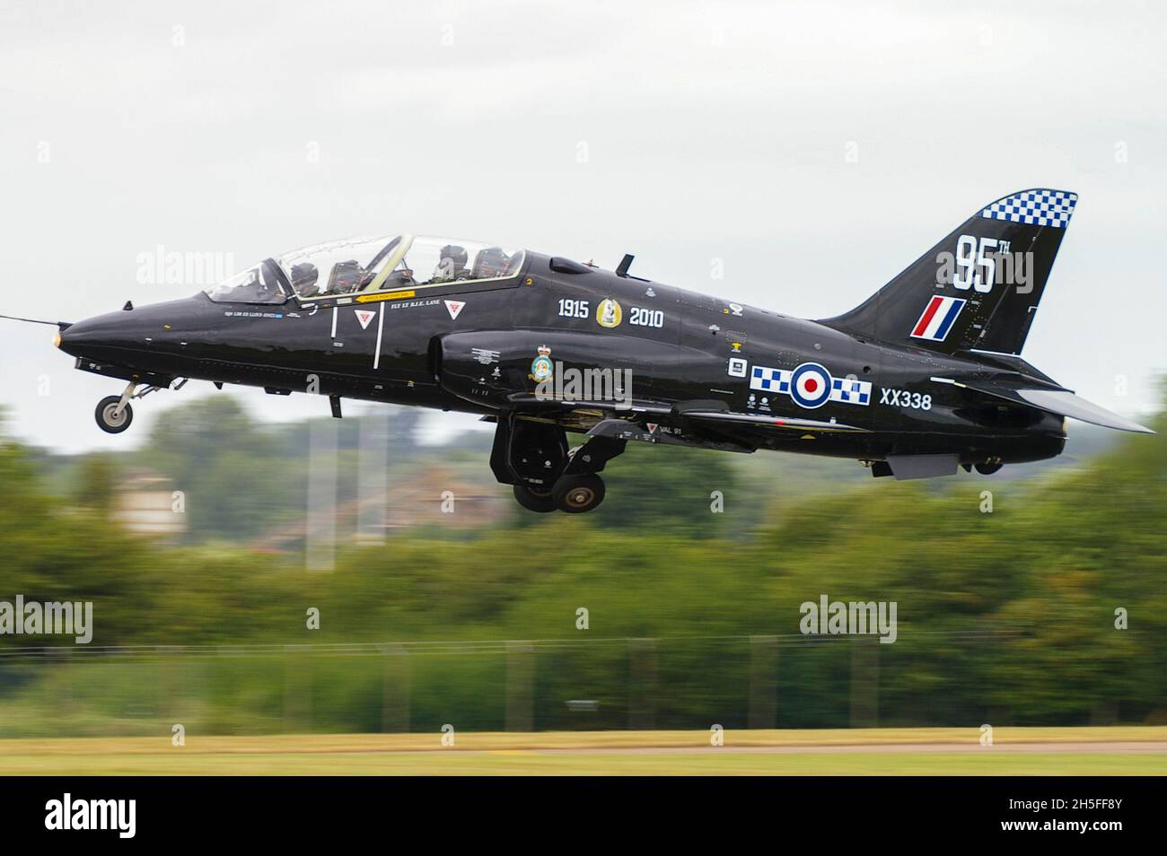 Royal Air Force BAe Hawk T.1 XX338 of 19 Squadron taking off at the Royal International Air Tattoo 2010 in 95th anniversary markings Stock Photo