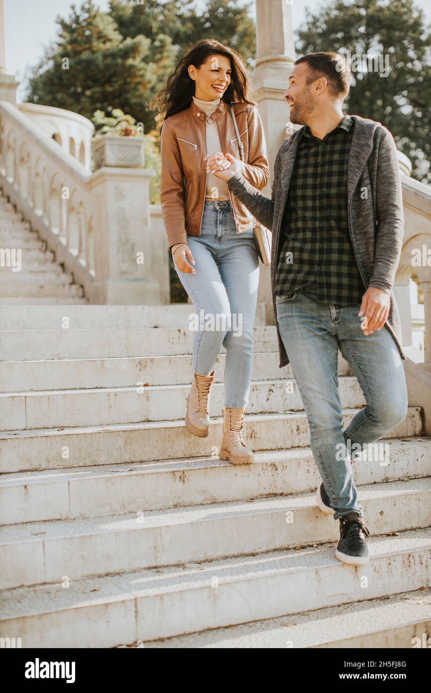 Man woman walk stairs hi-res stock photography and images - Alamy