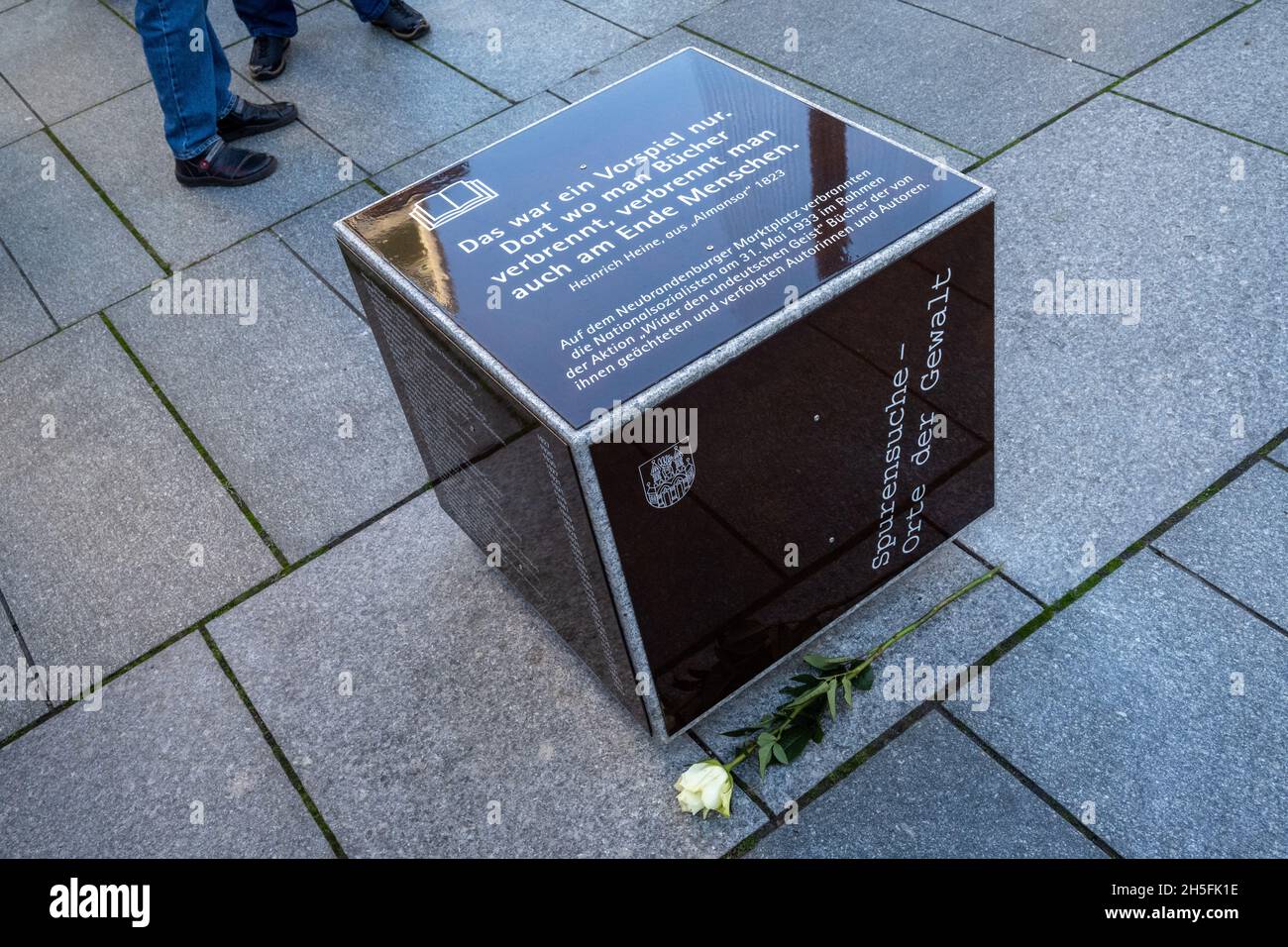 09 November 2021, Mecklenburg-Western Pomerania, Neubrandenburg: From  Tuesday, a memorial sign on Neubrandenburg's market square will commemorate  the burning of books by the National Socialists in May 1933. The memorial  sign was