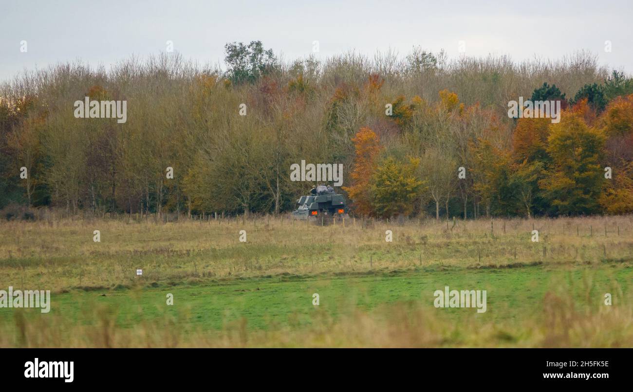 british army military AS-90 (Gun Equipment 155mm L131) armoured self-propelled howitzer gun on a military exercise SPTA Wiltshire Stock Photo