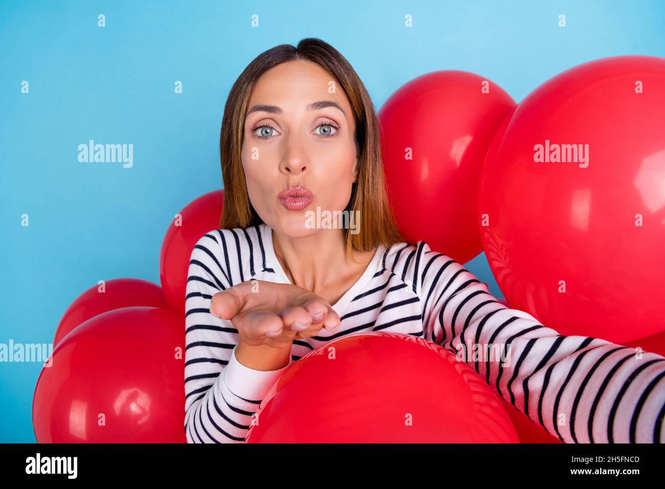 Photo Of Attractive Beautiful Woman Dressed Striped Pullover Tacking Selfie Sending Arm Kiss Red