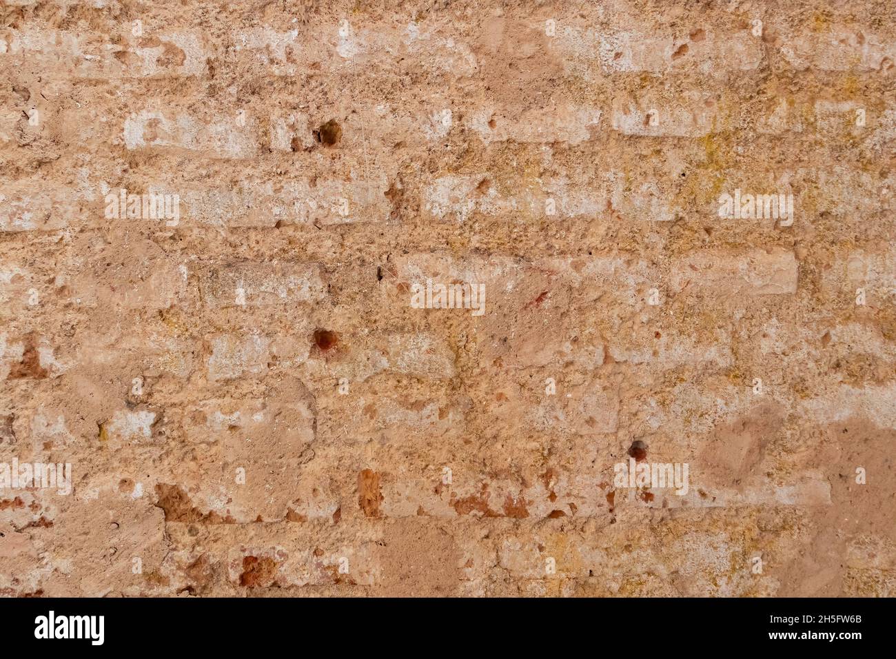 wall of executions by firing squad with bullet marks, used in spanish civil war Stock Photo