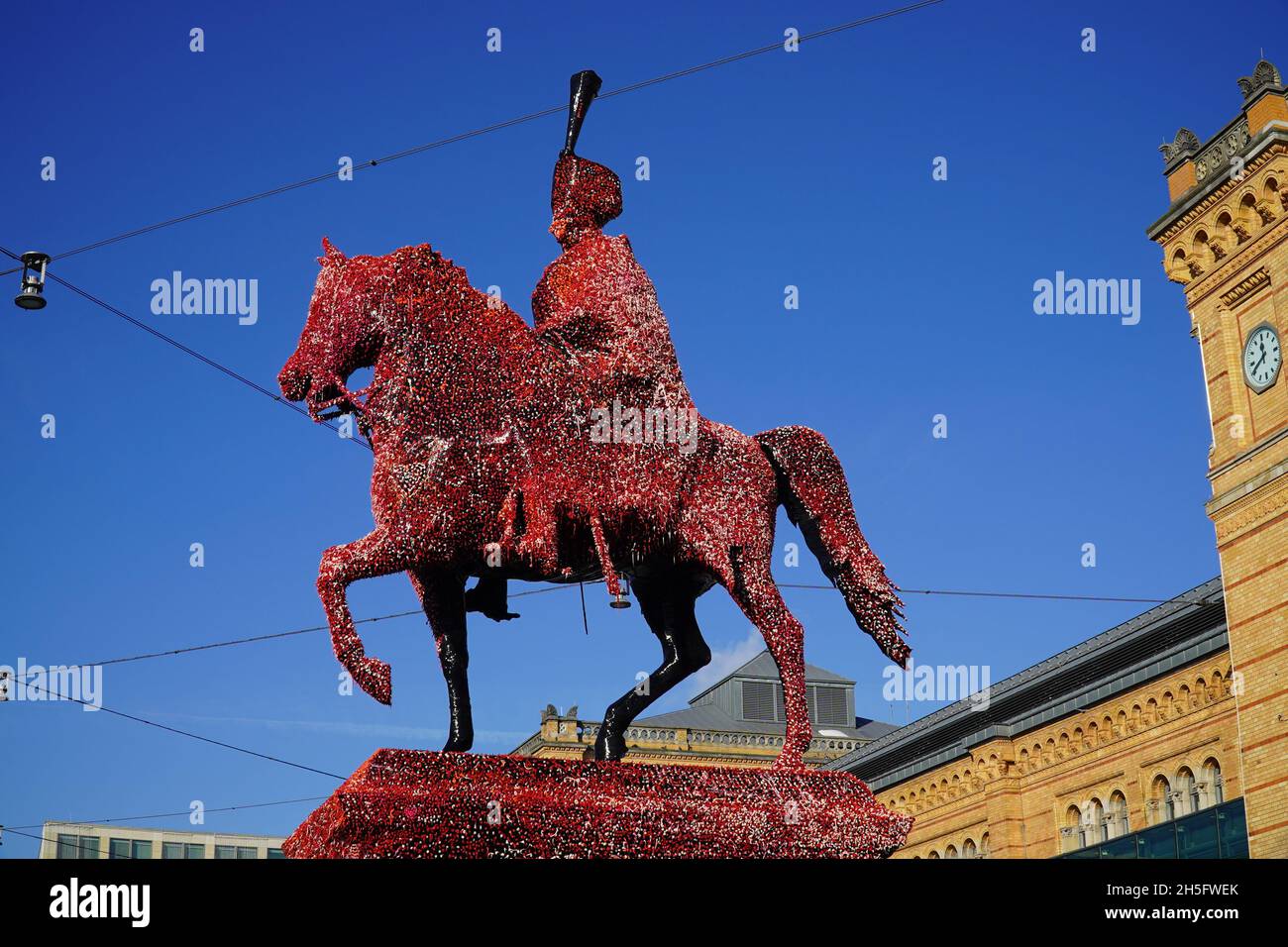 Equestrian statue of Ernest Augustus, King of Hanover. The monument was now wrapped in black foil and all citizens may decorate it with colorful dots. Stock Photo