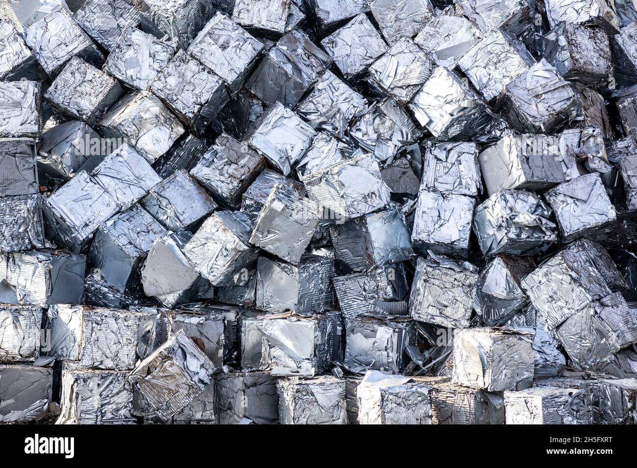 Scrap metal compressed into cubes, recycling yard Stock Photo Alamy