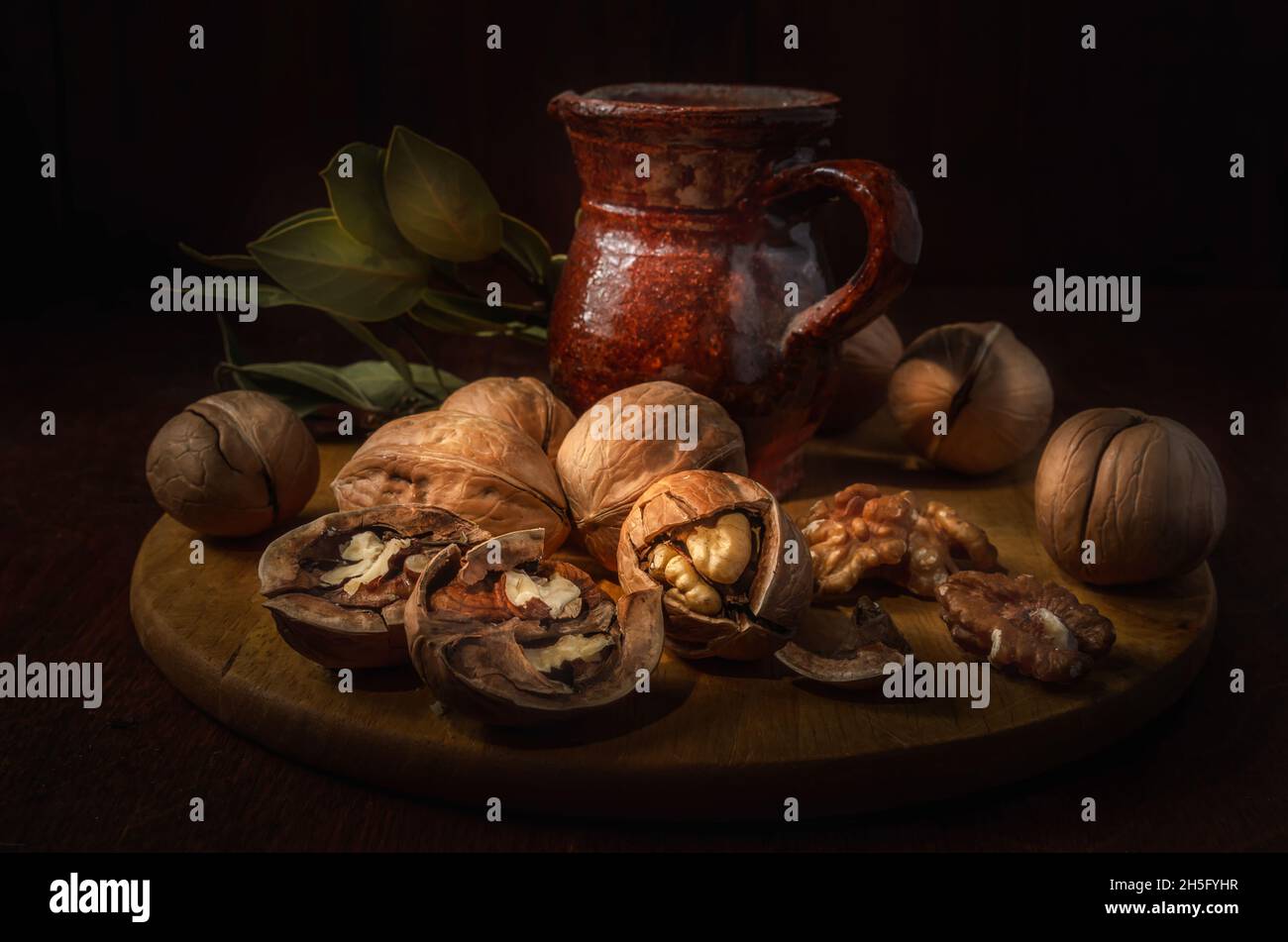 walnuts on a dark background in a rustic style Stock Photo