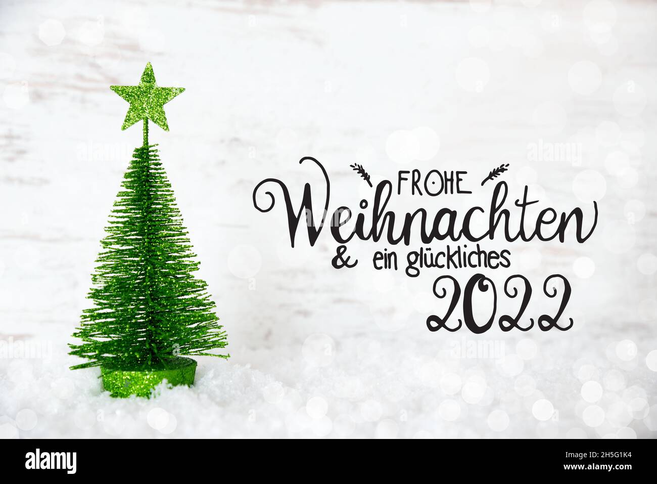 Green Country Christmas 2022 Green Christmas Tree, Star, Snow, Glueckliches 2022 Means Happy 2022 Stock  Photo - Alamy
