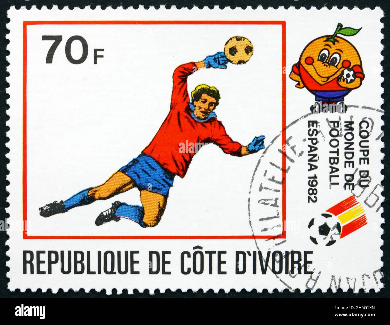IVORY COAST - CIRCA 1981: a stamp printed in Ivory Coast shows Goalkeeper in Action, Espana 82 World Cup Soccer Championship, Spain, circa 1981 Stock Photo