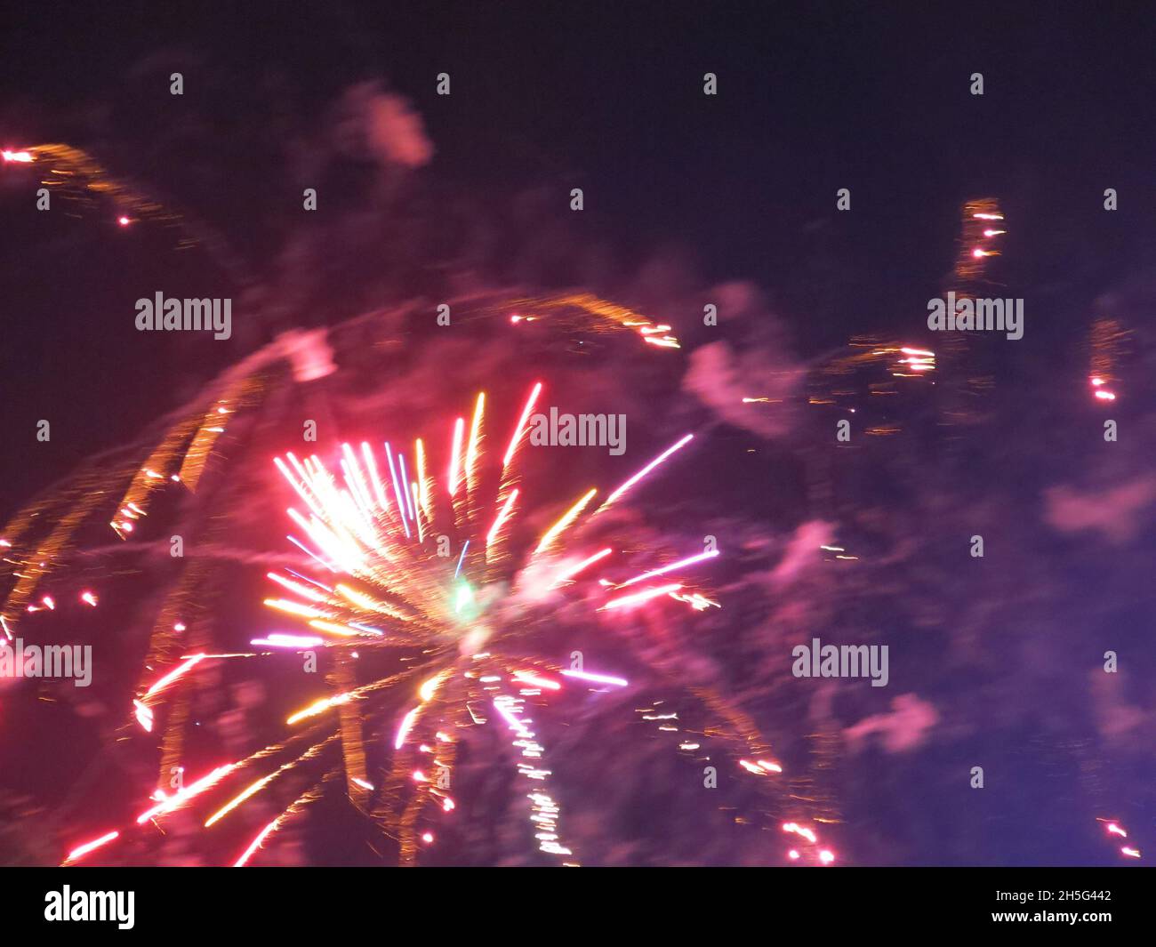 Exploding fireworks in the night sky; Bonfire Night, November 2021 Stock Photo