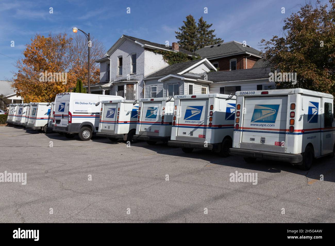 Peru - Circa November 2021: USPS Post Office Mail Trucks. The Post Office is responsible for providing mail delivery. Stock Photo