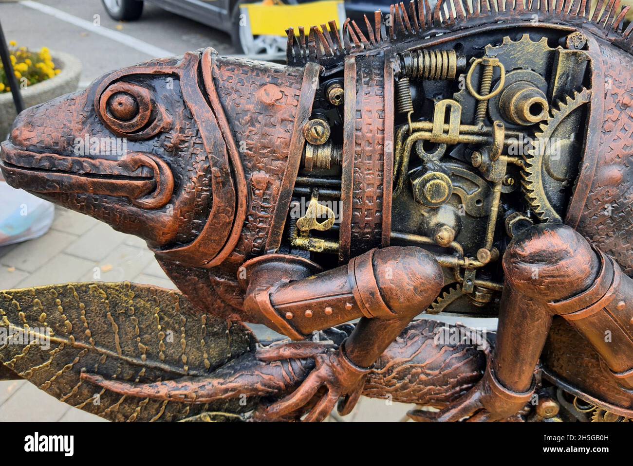 A forged metal figurine, funny unusual iron iguana are presented at Koval  fest exhibition. Art object sculpture decorative metal statue Stock Photo -  Alamy