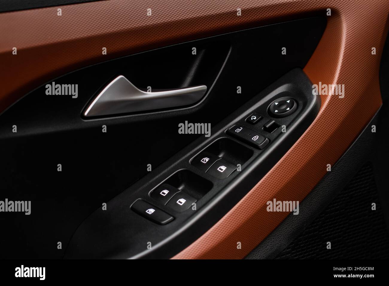 Close up view of button controlling window in modern car interior ...