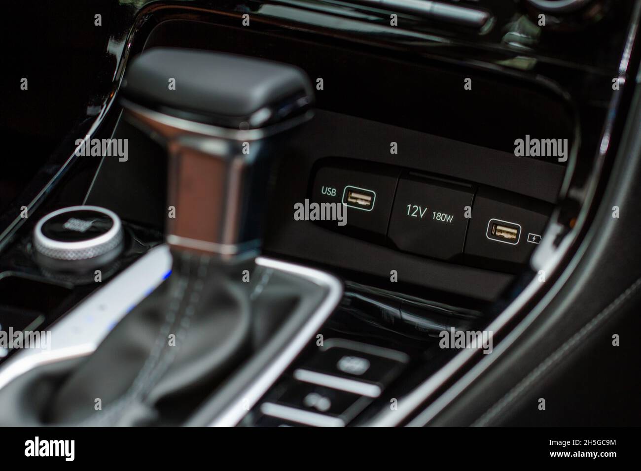 Modern car outlet socket and 12V power outlet socket. Stock Photo