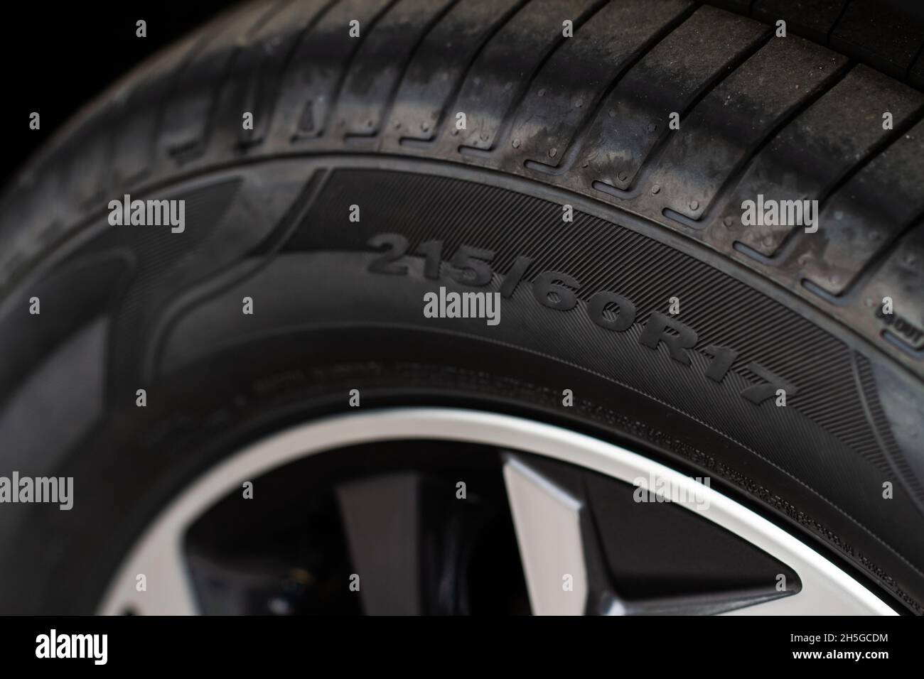 Close up view of tire with tire width, height and wheel diameter