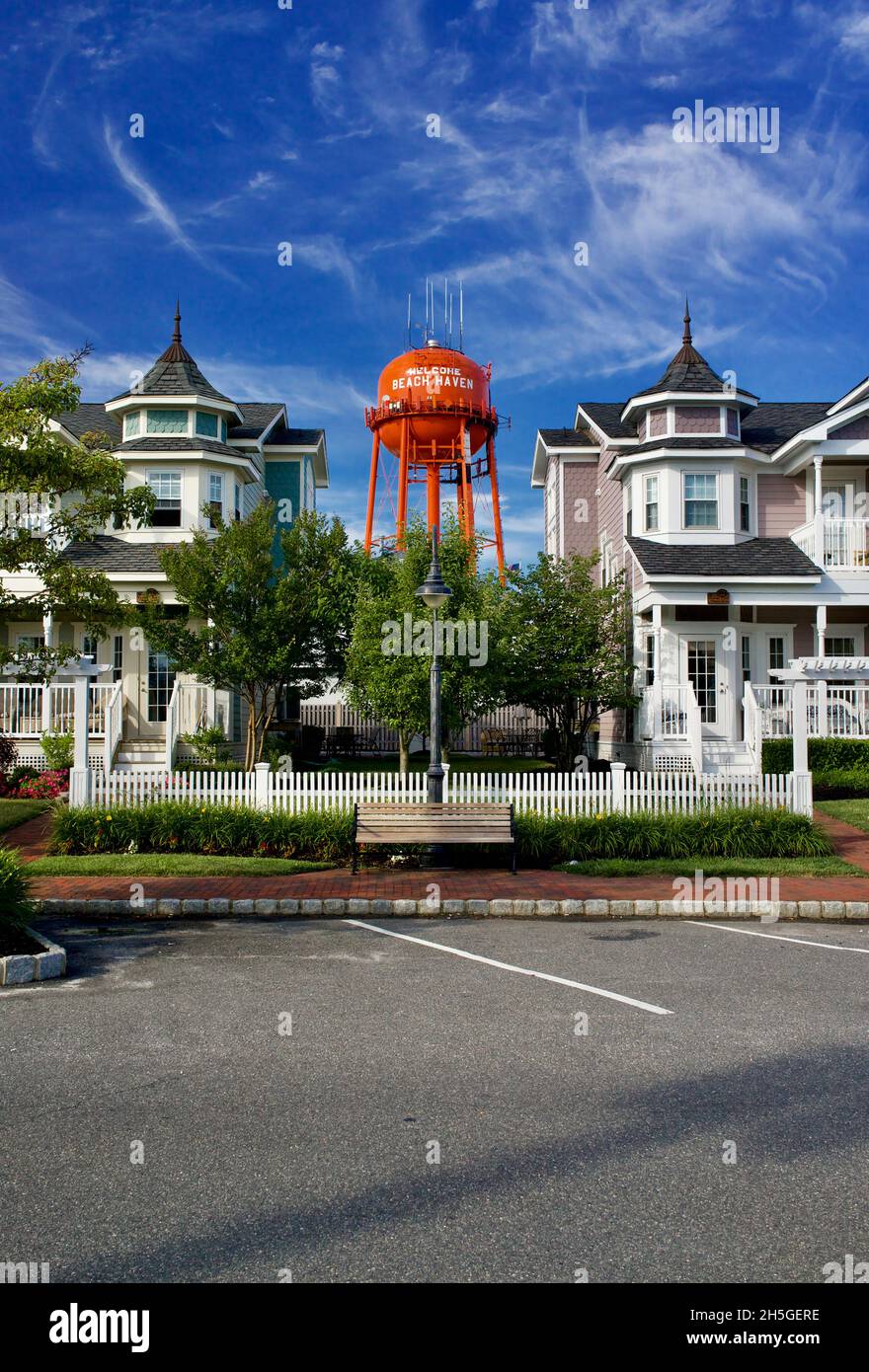 Beach Haven’s water tower looms in the background of downtown condos built in the early 2000’s.  Clean, graphic composition on a bright, summer day Stock Photo