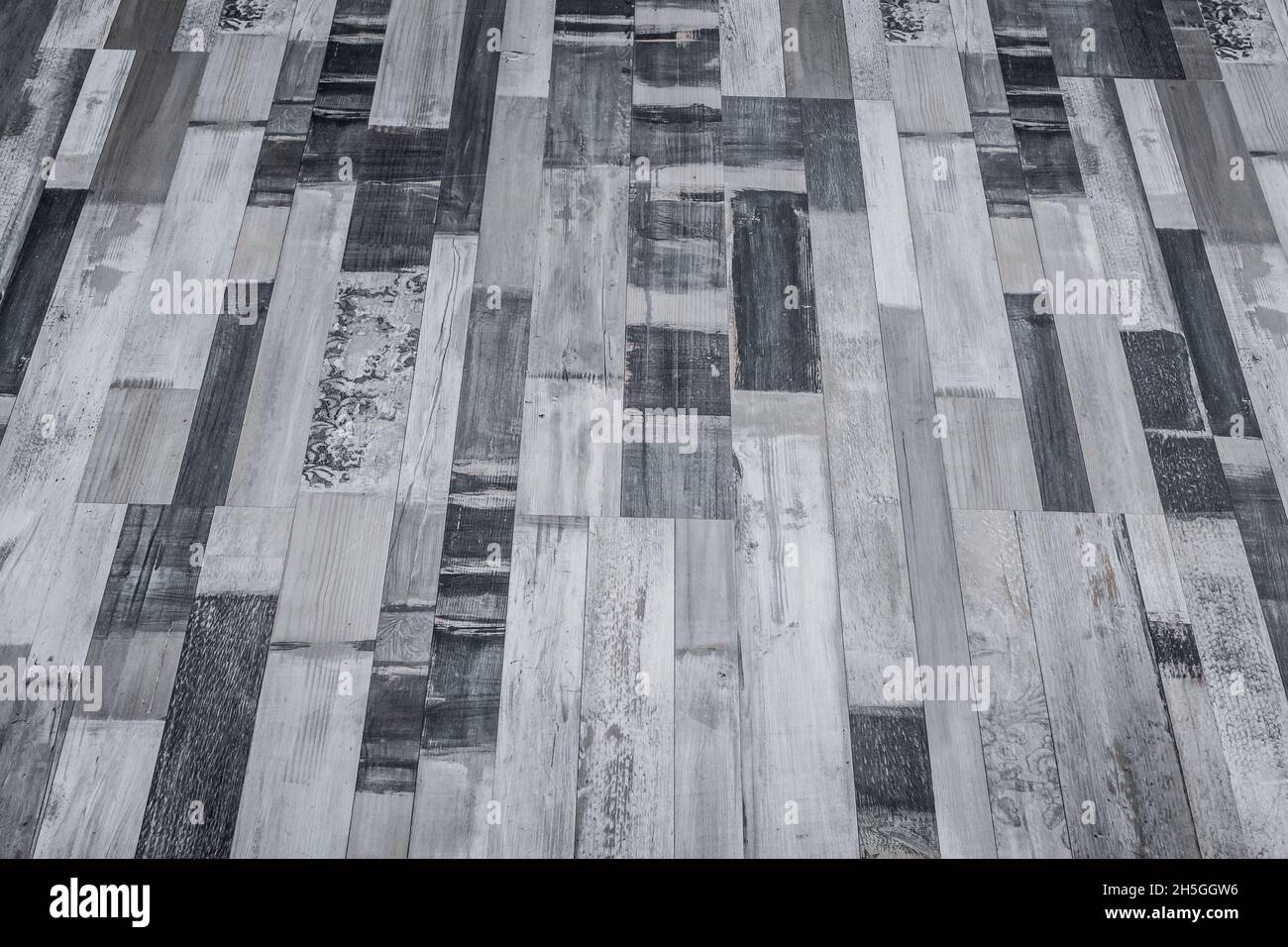 Dark grey floor wooden surface parquet or laminate texture background. Stock Photo