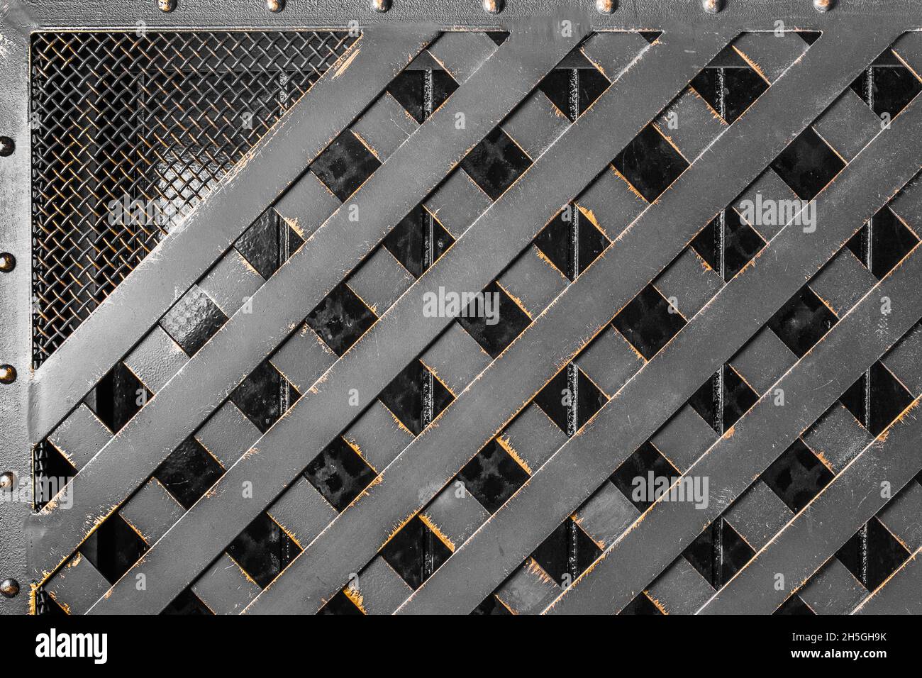 Black Mesh Abstract Iron Lattice Pattern Steel Dark Texture Grid Background. Stock Photo